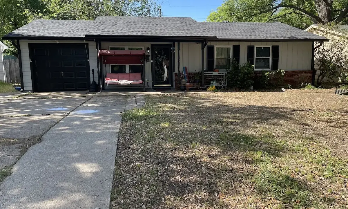 Asphalt Shingle Roof Repair crew at work on a residential roof in Hapeville
